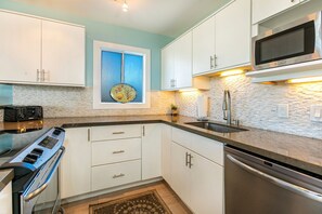 Condo, 2 Bedrooms | Private kitchen | Fridge, oven, coffee/tea maker, toaster