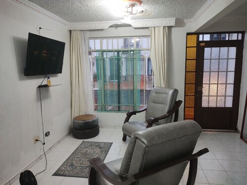 House in gated community with swimming pool