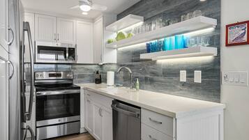 Condo, 2 Bedrooms | Private kitchen | Fridge, oven, coffee/tea maker, toaster