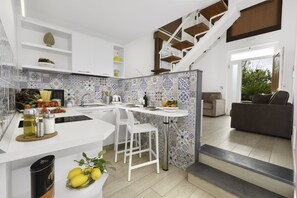 Apartment, Patio | Private kitchen | Coffee/tea maker, electric kettle - Eterea Charming Suites (Sorrento)