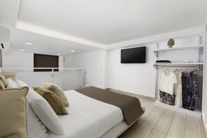 Appartement, patio | 1 slaapkamer, een minibar, een bureau, gratis wifi