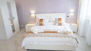 2 chambres, coffres-forts dans les chambres, fer et planche Ă repasser