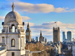 Premium bedding, down comforters, memory foam beds, minibar