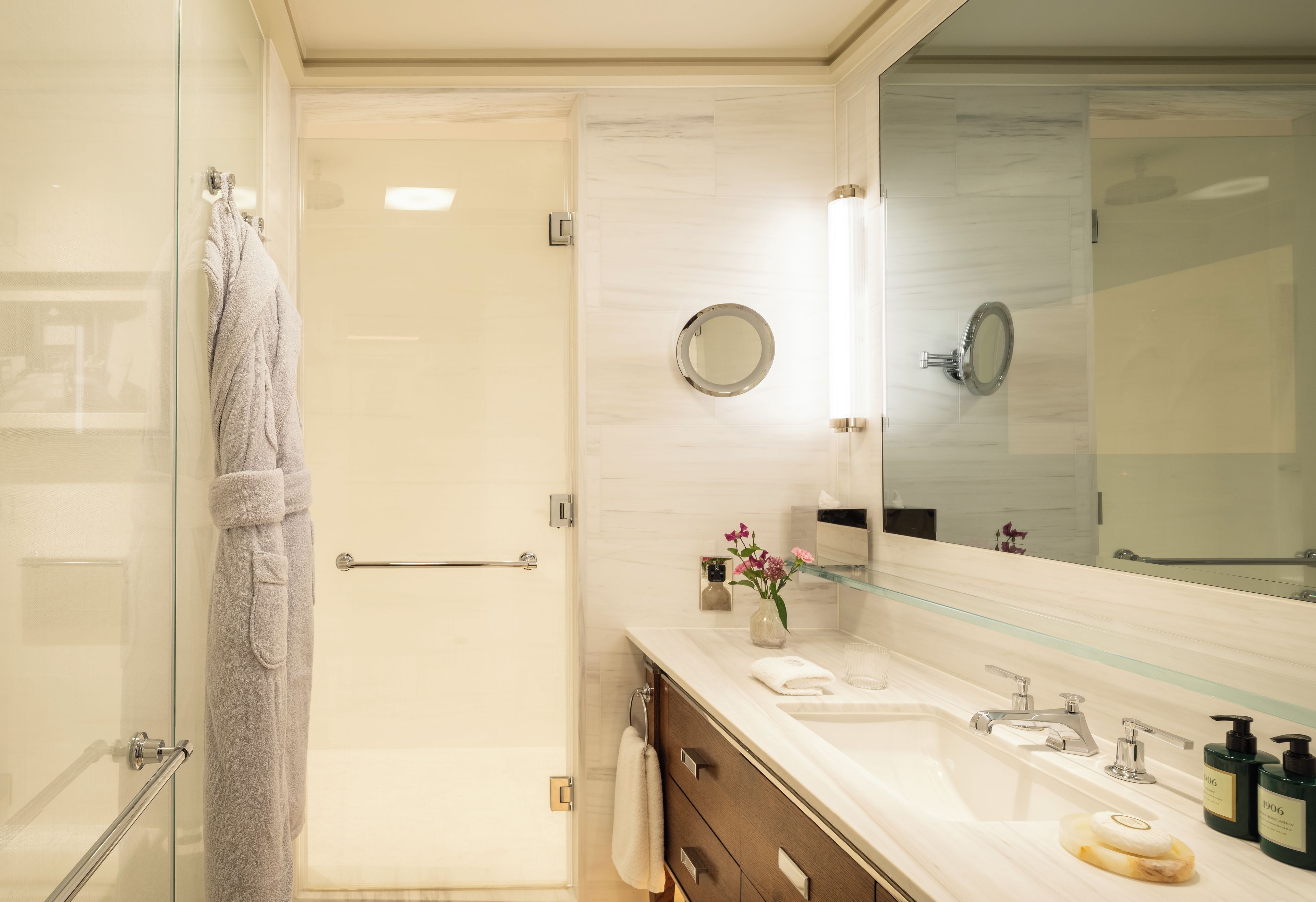 Executive Room | Bathroom | Rainfall showerhead, designer toiletries, hair dryer, bathrobes
