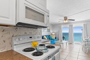 Condo, 1 Bedroom, Ocean View (SU1012 - 1.5 Bathrooms) | Private kitchen | Full-size fridge, cookware/dishes/utensils