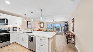 Condo, 2 Bedrooms | Private kitchen | Dishwasher, cookware/dishes/utensils