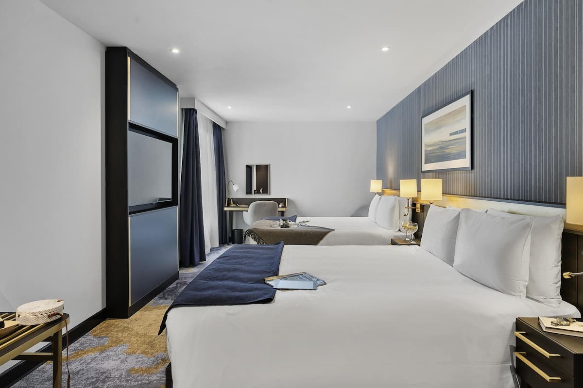 Classic Room, 2 Double Beds | Minibar, in-room safe, desk, laptop workspace