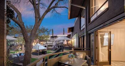 Expansive 2-bed loft with fireplace, full kitchen, smart TVs, and access to an award-winning courtyard & resort pool.