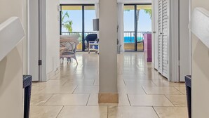 A hotel lobby with a tiled floor, a welcome mat, and a view of the outside. - Sugar Beach Resort, #540 2 Bedroom Condo by RedAwning (Kihei)