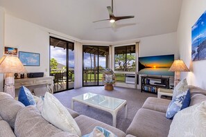 Condo, 3 chambres | Aire de séjour