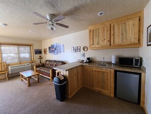 Suite, Multiple Beds | Private kitchenette | Coffee/tea maker