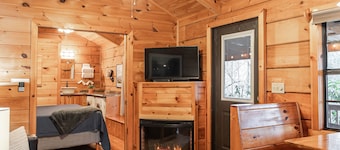 Wooded Couples Log Cabin w/ Hot Tub (Pet-friendly)