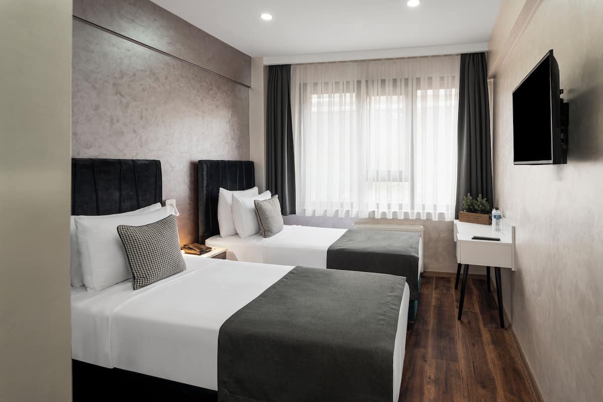 Standard-Zweibettzimmer | Hochwertige Bettwaren, kostenloses WLAN, Bettwäsche