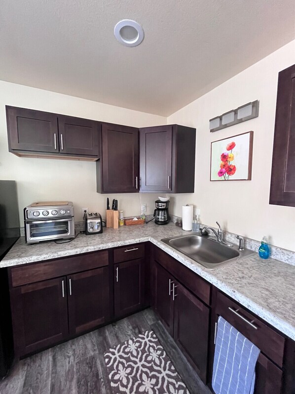 Fridge, microwave, coffee/tea maker, toaster