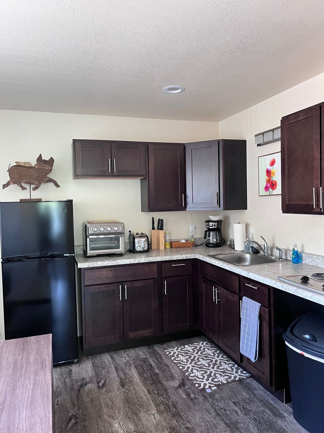 Fridge, microwave, coffee/tea maker, toaster