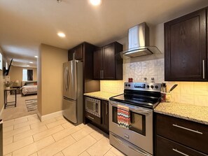 Coffee/tea maker, fridge, microwave, oven