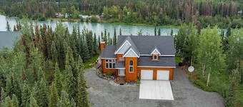 Beautiful 4 Bedroom Home secluded on the Kenai River with improved road access