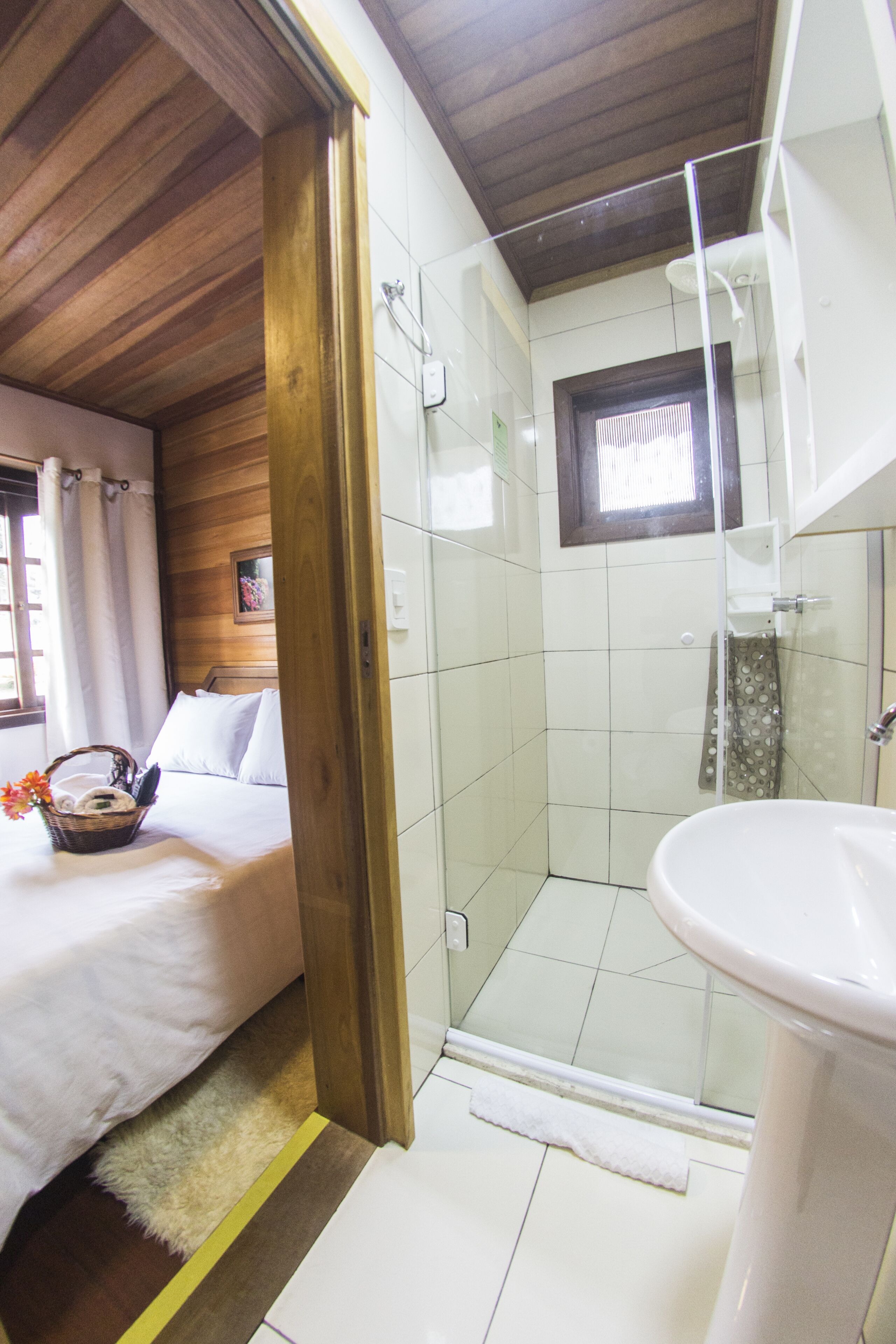 Habitación clásica doble | Baño | Ducha y cabezal de ducha tipo lluvia