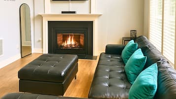Smart TV, fireplace, table tennis, books