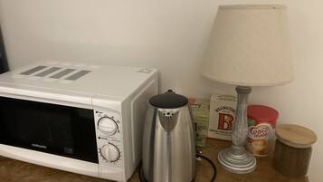 Apartamento, várias camas | Cozinha privada | Micro-ondas, fogão, cooktop, chaleira elétrica