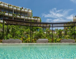 4 outdoor pools, open 9:00 AM to 9:00 PM, pool umbrellas, sun loungers