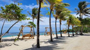 On the beach - Palm Breeze Casita at Curacion Beach Resort (Brick Bay)
