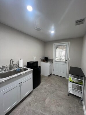 Fridge, microwave, coffee/tea maker, toaster