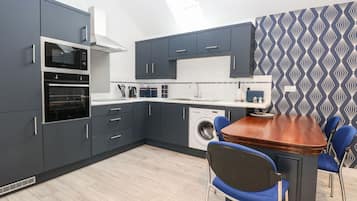 Fridge, electric kettle, toaster, cookware/dishes/utensils