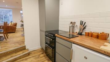 Fridge, electric kettle, toaster, cookware/dishes/utensils