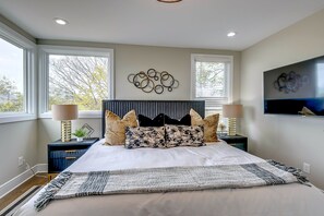 The 3rd-floor Primary Suite: A quiet retreat featuring a King bed, 55” Smart TV, and private ensuite.