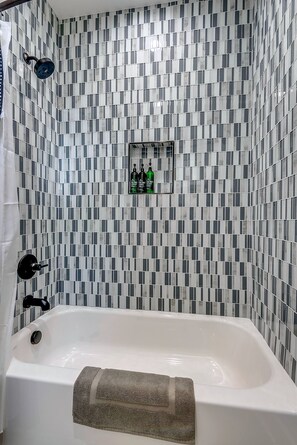 Sparkling clean bathrooms - a tub for you to relax in after a long day exploring the city.