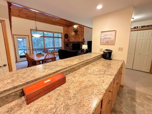 Granite countertops and breakfast bar.