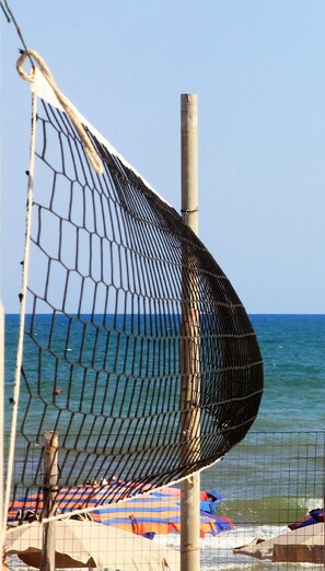 Private beach, sun-loungers, beach umbrellas, beach volleyball