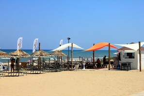 Private beach, sun-loungers, beach umbrellas, beach volleyball