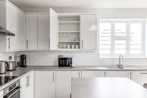 Fridge, microwave, oven, stovetop - Sleek Marylebone 2BR w/ Roof nr Underground, by Blueground (London)