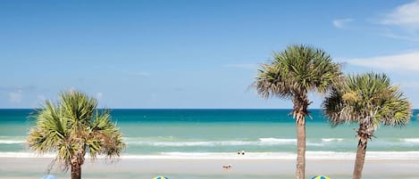On the beach, sun loungers, beach towels
