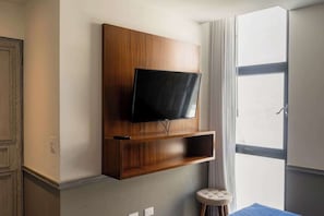 Queen bedroom with wood headboard