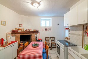 Fridge, oven, dining tables