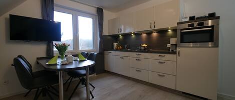 Fridge, microwave, dishwasher, coffee/tea maker