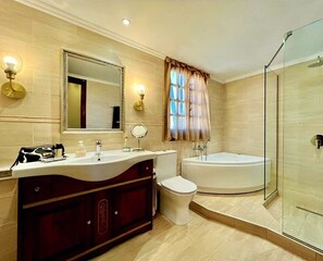 Shower, jetted tub, hair dryer, towels