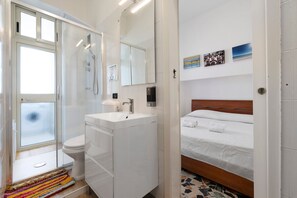 Bathtub, hair dryer, towels
