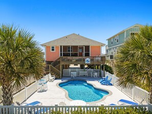 A heated pool - Oceanview Absolute Serenity, a 4-bedroom retreat in Oak Island for up to 10 guests. (Oak Island)