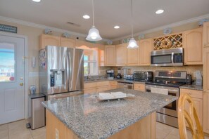 Fridge, microwave, oven, stovetop - 4BR/3BA Home - 2nd Row, Ocean Views, Steps to Beach, Pool w/ Heating, Sleeps 10 (Oak Island)