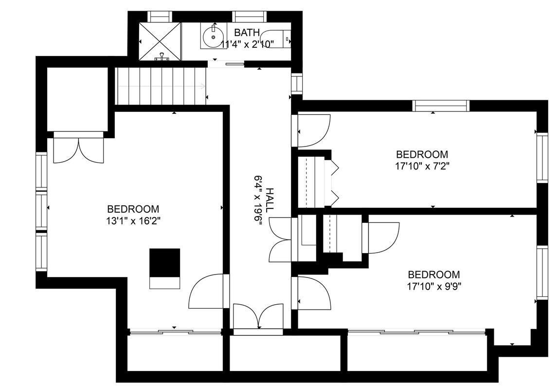 Plano de planta que muestra tres dormitorios, un baño y una sala de estar.