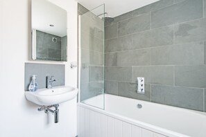 Combined shower/tub, hair dryer