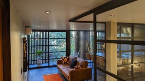 Comfort Apartment | Living area - Jungle Loft in Aldea Zama l Pool l Grill (Tulum)