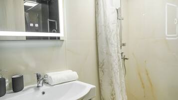 Hair dryer, towels, toilet paper