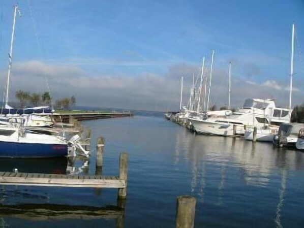 Boats docked at the marina, offering serene waterfront views.