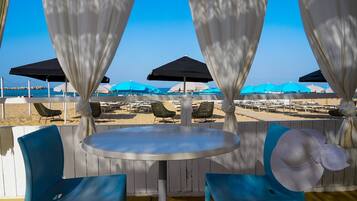 Private beach, beach shuttle, sun loungers, beach umbrellas