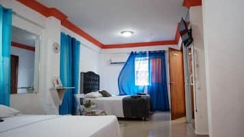 Family Twin Room | In-room safe, blackout curtains, iron/ironing board, free WiFi